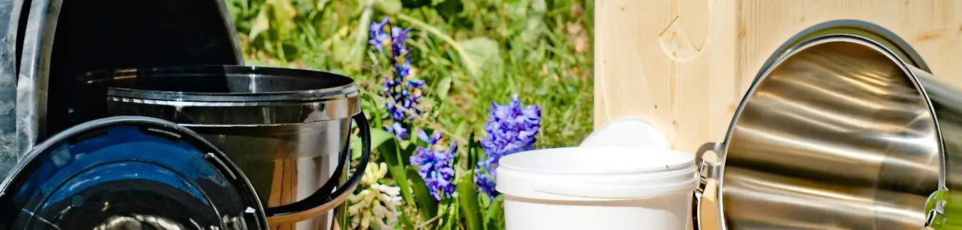 Buckets and containers for dry toilets